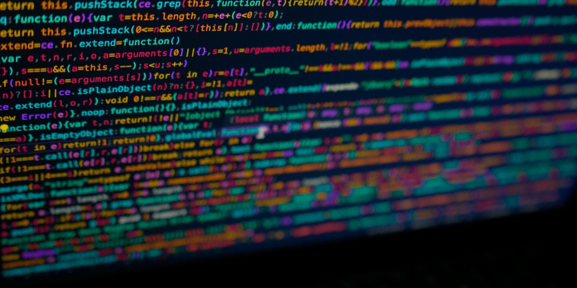 xAPI-code weergegeven in kleurrijke regels op een computerscherm in donkere modus